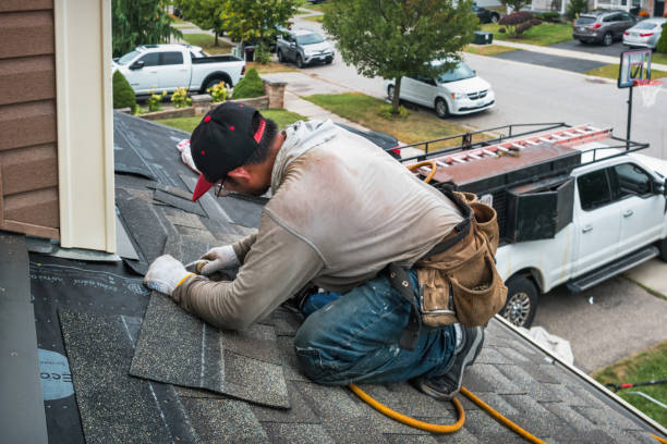 Professional Roofing technician working in D'Iberville, MS